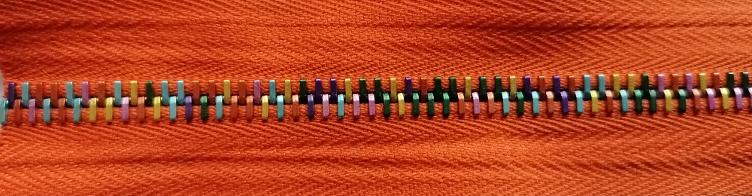 Reissverschluss, Eloxal 6 RIO, Meterware, orange mit pinkigen, orangen, goldigen, türkisen, dunkelgrünen, violetten, Col. 2102